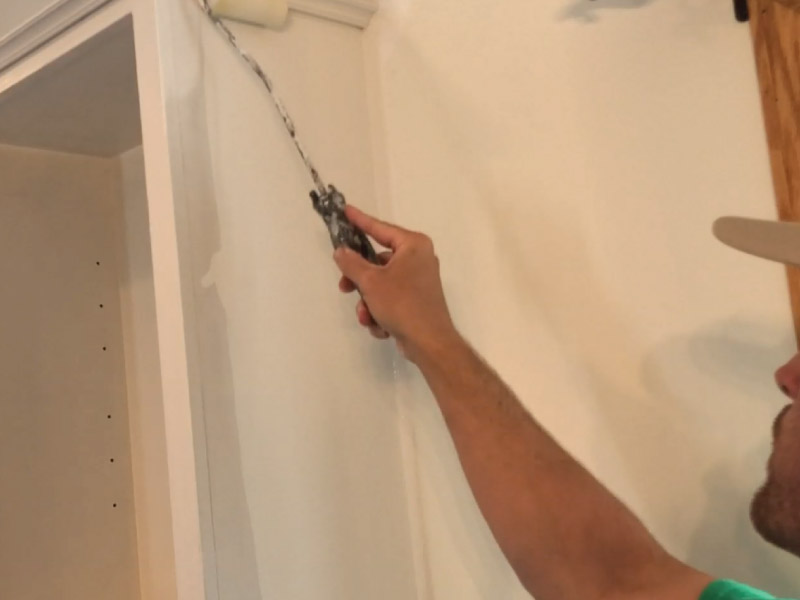 Using flock roller to apply Benjamin Moore Advance to cabinet boxes