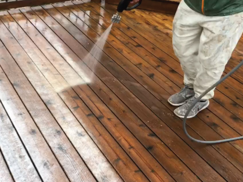 Applying deck wood conditioner to neutralize PH