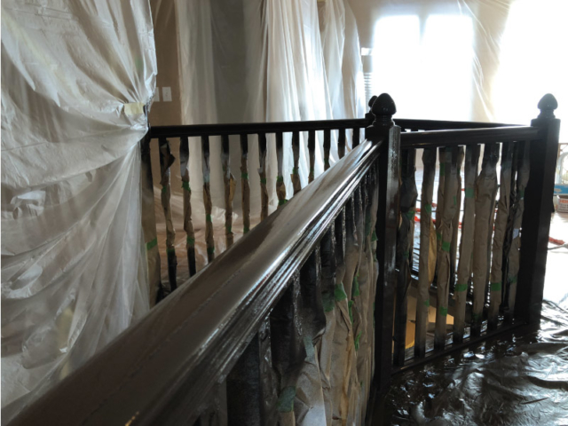 Painted staircase in Eden Prairie with enamel drying
