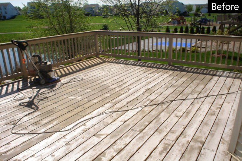 Severely sun damaged wood deck getting sanded