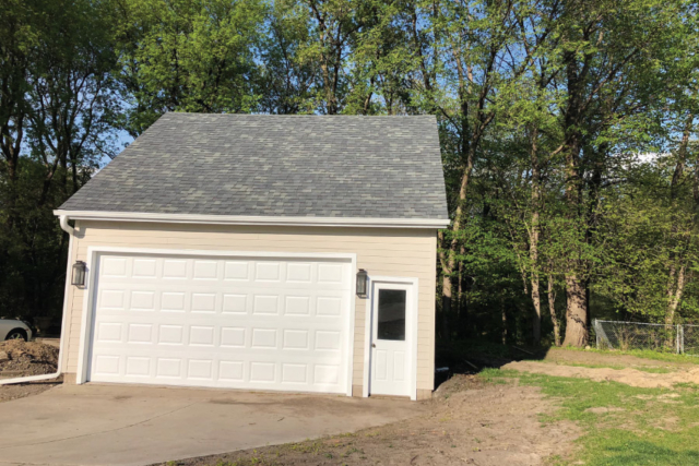 Detached garage recently painted on home in Prior Lake