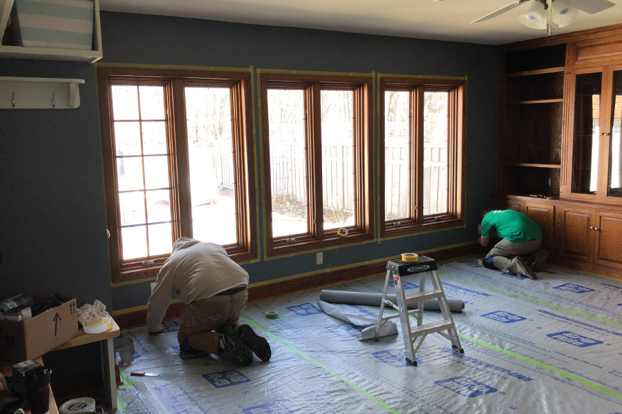 OKeefe painting crew prepping for painting trim and built in cabinets