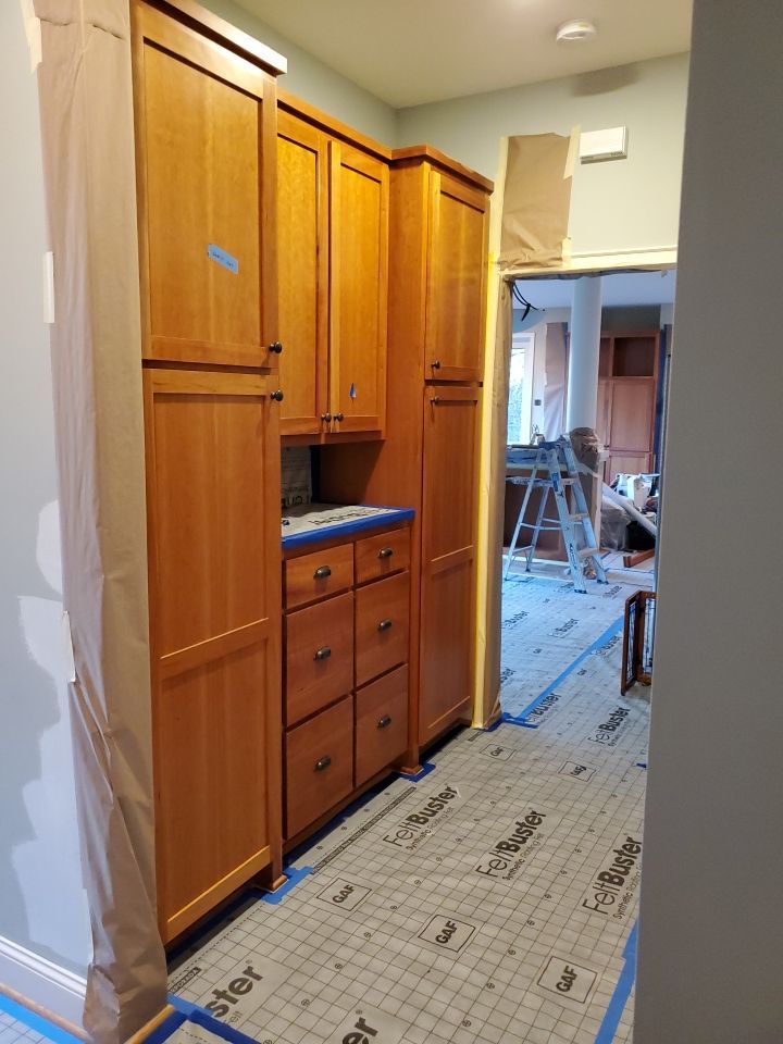Hallway built in maple cabinets