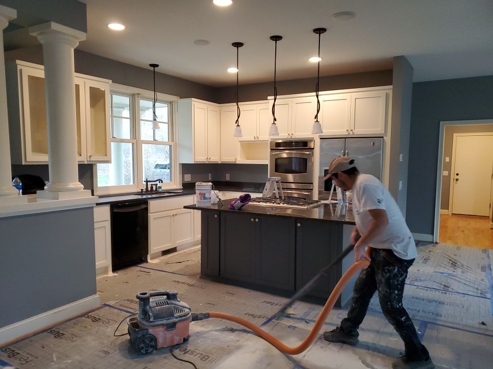 Cleaning jobsite after painting cabinets